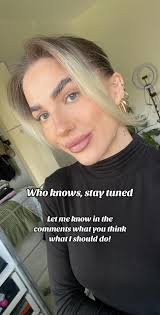 Girl with Blonde Roots Growing Her Hair