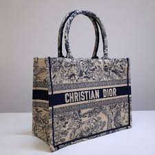 The design is fully embroidered with the hallmark blue toile de jouy motif. Dior Unisex Small Dior Book Tote Blue Toile De Jouy Embroidery Lulux