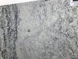 I use a granite cleaner & polish on our granite countertops and wipe with a paper towel for daily cleaning. White Ice Granite Direct