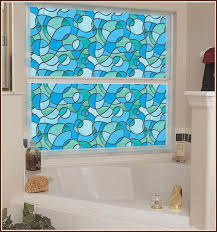 Stained glass effect window film is an affordable and easy to apply alternative to real stained glass, allowing you to transform your windows in minutes. Odyssey Stained Glass Privacy Window Film Wallpaper For Windows Stained Glass Window Film Bathroom Windows Creative Window Treatments