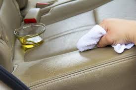 If necessary, use a separate cloth or towel to wipe off any excess cleaner. How To Repair Cracked Leather Car Seats Ehow Car Cleaning Hacks Cleaning Leather Car Seats Leather Car Seats