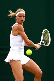 Camila Giorgi Photos Camila Giorgi Of Italy Plays A Backhand Against Ekaterina Makarova Of Russia During The Tennis Players Female Camila Giorgi Tennis Match