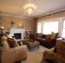 Mixing Fabric And Leather Furniture Creates Great Texture Contrast While Still Matching Burgundy Living Room Brown Living Room Zebra Living Room