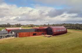 Bosske Architecture Designs Red Super Shed For Australian Dairy Farm Architecture Agricultural Buildings Architecture Design