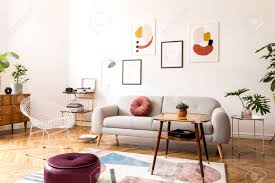 Find & download free graphic resources for coffee menu. Minimal Retro Interior Design Of Living Room With Grey Couch Design Armchair Vintage Coffee Table Lamp And Stylish Decorations Bright Room Brwon Wooden Parquet And Poster Gallery On The Wall Stock Photo