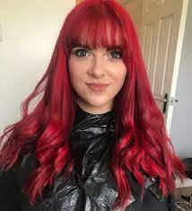No, she hasn't gone hairless again, she tries some red hot streaks on hair cropped hair this time. 5 Mesmerizing Red Hairstyles With Bangs That Women Love Wetellyouhow