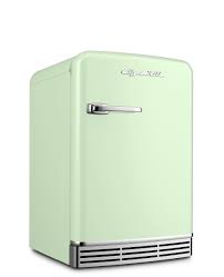 Spacious storage in the refrigerator features 3 adjustable glass shelves, specialty bottle shelf, and bright interior lighting. Big Chill Retro Mini Fridge Big Chill