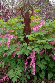 Goddess Amidst Bleeding Hearts Bleeding Heart Garden Art Beautiful Flowers