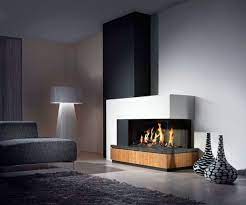 Camini Ad Angolo Soggiorno Stile Minimal Arredamento Salotto Con Camino Arredamento Sala Con Camino Camini Contemporanei