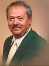 Louis Eugene “Lou” Holland (1924-2015)