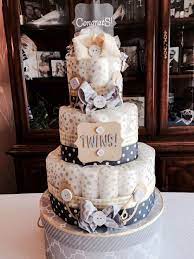 Diaper Cake That I Made For A Friend Fit Atop A Hatbox Lift The Hatbox To Find More Goodies For Baby Inside Baby Diaper Cake Diaper Cake Diy Diaper Cake