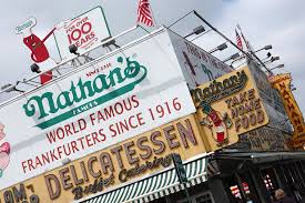 Clearly emotional as he had his hand raised while receiving the iconic nathan's mustard belt for the coney island landmark's hot dog eating contest, chestnut has now won it 14. Nathan S Hot Dog Contest Returns July Fourth Outdoors And With A Crowd