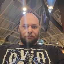 All that hair sticking out of the side of that helmet.