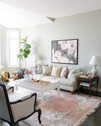 Pink carpeting can definitely be a decorating challenge. Living Room With Pink Rug Marble Print Pillows And White Couch Round Carpet Living Room Pink Rug Entertainment Room Design