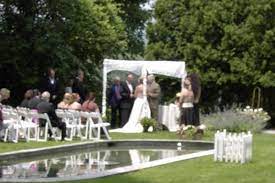 A Wedding Under My Chuppah In The Gardens At The Norwich Inn And Spa Chuppah Wedding Mystic Aquarium