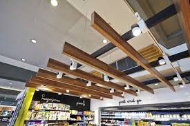 Both can find wood beams and they can be used for your diy projects. Floating Ceiling With Lightweight Supaslat Maxi Beam Supawood Floating Ceiling Wood Slat Ceiling Ceiling Design Modern