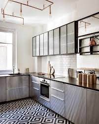 Modern kitchen tiles design black and white. Modern Minimalistic Industrial Kitchen With Black And White Patterned Floor Tiles The Geometric Tile Pattern Is Kitchen Mosaic Kitchen Design Kitchen Tiles