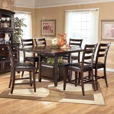 Scroll down to check our latest range. Ridgley 7 Piece Counter Height Table Set By Signature Design By Ashley Brown Dining Room Table Brown Dining Room Round Dining Room