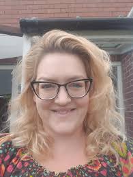 This is what 46 looks. Happy birthday to me. 🥳 Photo description for  anyone who needs it. It's me! In my garden with greenery behind me. I'm  wearing new make up I