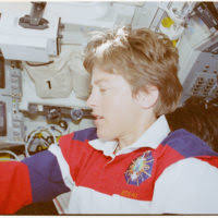 Mission Specialist Catherine "Cady" Coleman exercises