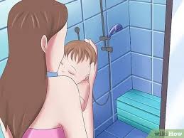 First dip the clean cloth in the warm water. How To Give Your Baby A Bath When Traveling With Pictures