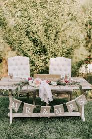 Pretty In Pink A Backyard Wedding With Relaxed Elegance Ruffled Wedding Backyard Reception Backyard Wedding Decorations Backyard Wedding