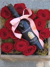 Download rose flower stock photos. Red Roses In Wooden Box With Wine Flowers At The Door