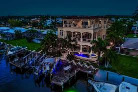 Pictured Night Shot Of The Back Of This Fort Myers Beach Luxury Home For Sale For 2 495 000 Dan Starowicz Re Waterfront Homes Fort Myers Fort Myers Beach