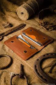 this simple wallet was designed to hold two iphone 7 or iphone 7 plus size phones your cash or ca leather iphone wallet leather wallet case iphone wallet case