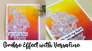 create an ombre background using versafine clair and vellum flowers