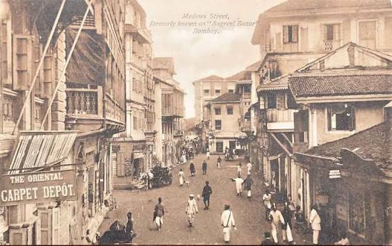 Street Scenes In British Era Bombay – 4 Postcards 1900s Five postcards that date from the 1900s show street scenes in British Era Bombay (Mumbai). The first postcard is of Medows Street