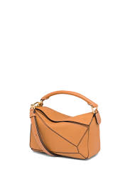 Maybe you would like to learn more about one of these? Small Puzzle Bag In Soft Grained Calfskin Light Caramel Loewe
