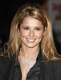 Cheryl Cole's long shimmering light brown hair, smoothed out with a flat  iron