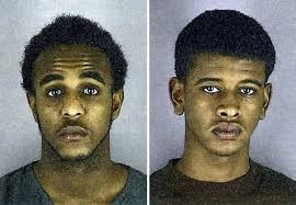 Suspects in triple homicide make initial court appearance