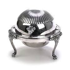 The serving tray has a design located across it. F B Rogers Silverplate Butter Dish