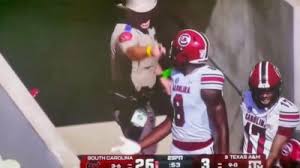 Cameras Caught Texas A&M Police Officer Blatantly Body-Checking & Screaming At Two South Carolina Players After Gamecocks TD vs. Aggies [VIDEO]