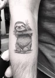 As we said previously, names are a popular choice in forearm tattoo designs and this one is a gorgeous example. Sloth Tattoo Small