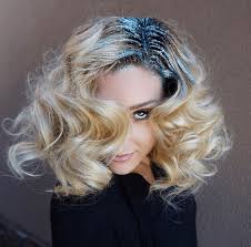 Use a cushion brush to pull the tips away from your face, avoiding the teased roots as much as possible and brushing from where the teasing ends, all the way to the roots. Turn Up The Volume Number 4 High Performance Hair Care