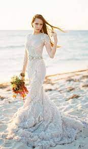 32 Beach Themed Wedding Ideas For 2016 Brides Elegantweddinginvites Com Blog Lace Mermaid Wedding Dress Wedding Dresses Wedding Dress With Feathers