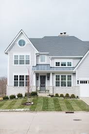 Using color matched flashing is a great way to blend the two surfaces together. Interior Design Ideas Grey Shingle Home Home Bunch Interior Design Ideas