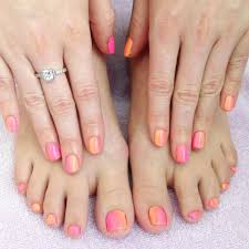 Complimentary colors for toe and hand nails. Matching Manicure And Pedicure With Pink Coral And Orange Fluro Ombre Nail Art Nail Art Ombre Manicure And Pedicure Ombre Nails