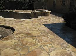 My deck is exposed aggragate, and the exposing is done primarily by acid washing, rubbing with a broom and power washing the concrete while its still workable. Stamped Concrete Acid Stain Polished Concrete Dallas Fort Worth