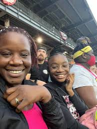 Softball wives selling shell art at holiday sale