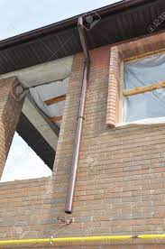 Need to extend your downspout? Rain Gutter Downspout Pipe Installation Stock Photo Picture And Royalty Free Image Image 91606157