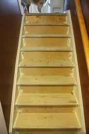 Stairway Remodel Part 1 Ripping Out Old Carpet And Finding Pressboard Plywood The Cookie Writer Diy Staircase Staircase Remodel Diy Diy Stairs