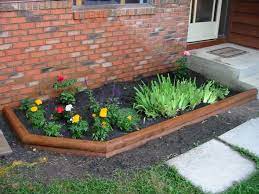 | alternatively, as in the next image, a chunky, style design adds a rustic element to a garden border. Image Result For Wood Flower Bed Border Small Flower Gardens Landscape Timber Edging Small Patio Garden