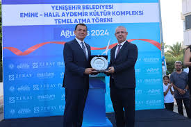 Kütüphane ve taziye evinden oluşan Yenişehir Belediyesi Emine