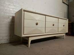 The dresser features stunning walnut wood grain and a sculpted diamond front. Diamond Front Mid Century Dresser By United Furniture Corporation At 1stdibs