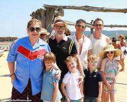 Elton john — cаунд к мультику король лев 04:00. Elton John And David Furnish Holiday With Sons Elijah And Zachary Daily Mail Online