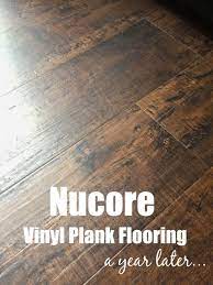 Nucore Flooring Review How It S Holding Up One Year Later Vinyl Laminate Flooring Waterproof Vinyl Plank Flooring Laminate Flooring On Stairs